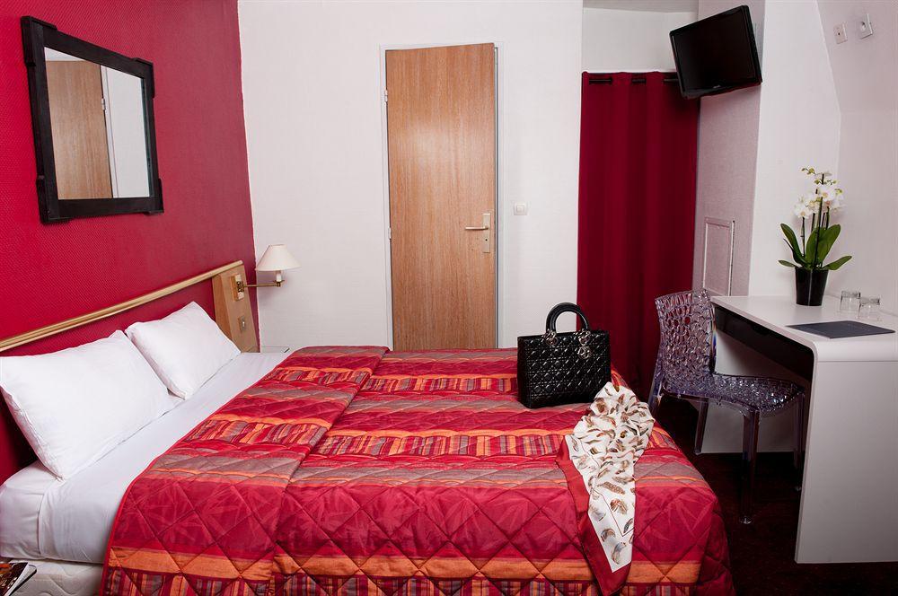 Hotel Moulin Plaza By Happyculture Париж Номер фото