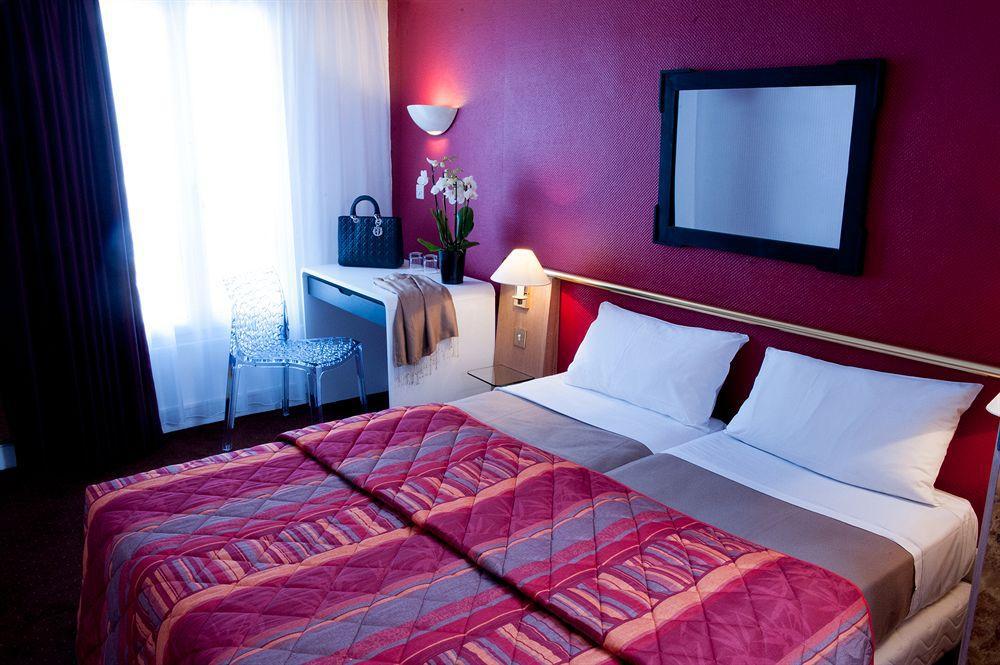 Hotel Moulin Plaza By Happyculture Париж Номер фото