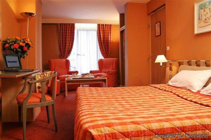 Hotel Moulin Plaza By Happyculture Париж Номер фото